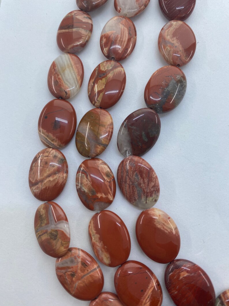 13x18mm Oval Red Bend Jasper Gemstone Beads 15\u201d strand of flat oval Jasper beads Red Jasper with orange pink and white. 22 per strand