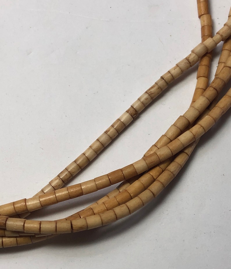 18 strand of Tea Dyed Heishi Bone Beads 3x5mm Antiqued bone beads. Carabao bone beads hand-made in the Philippines