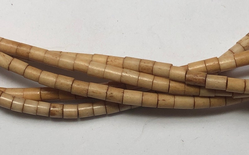 18 strand of Tea Dyed Heishi Bone Beads 3x5mm Antiqued bone beads. Carabao bone beads hand-made in the Philippines