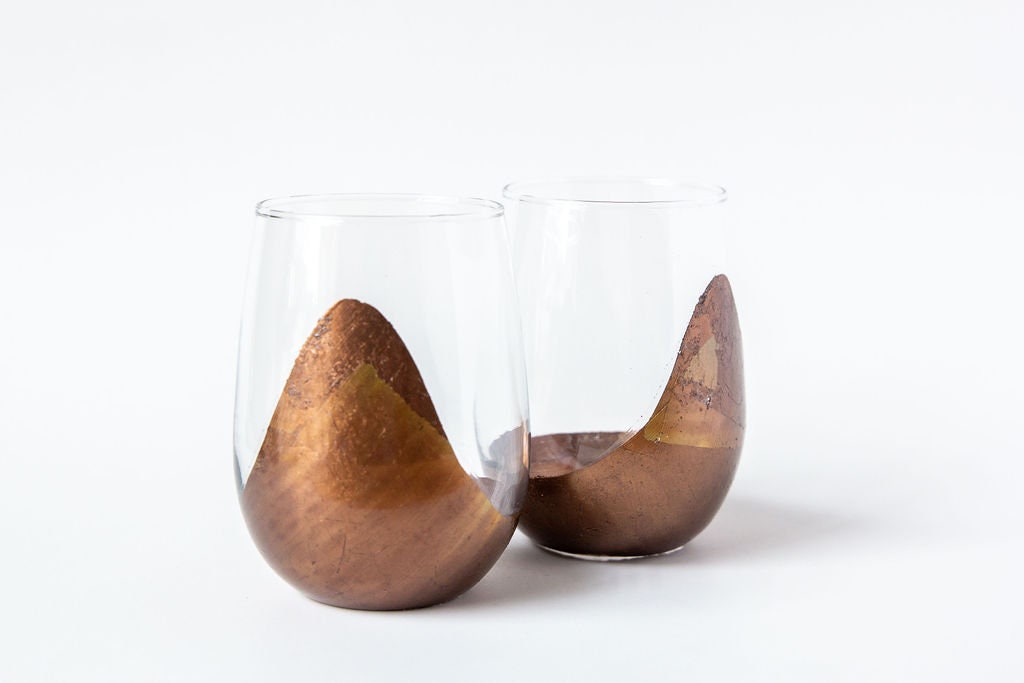 Tipsy Wine Glasses: Set of two delightfully curve wine glasses.