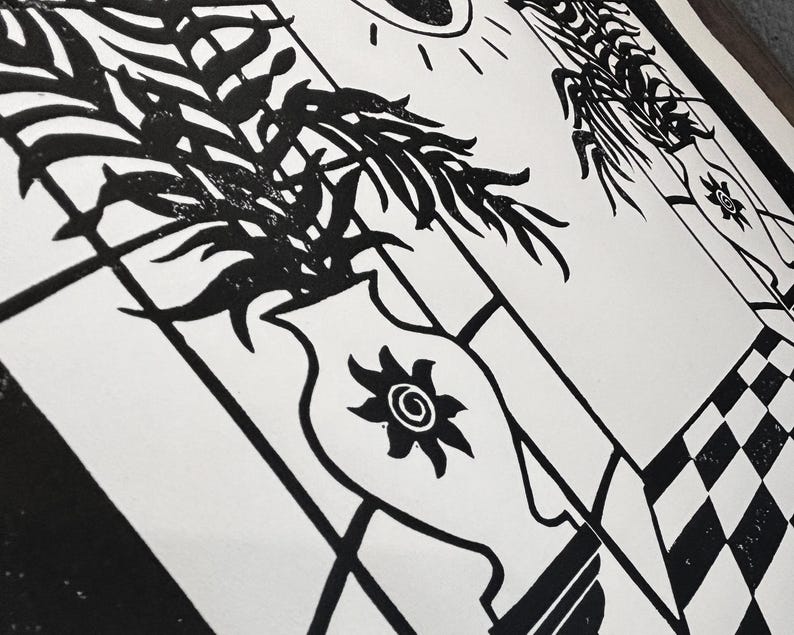 closeup of the middle section of the print. the small suns on each greek style vase have a spiral in the center and their rays are curved. this gives the impression of clockwise movement. each vase is on a narrow stand branching out from the wall