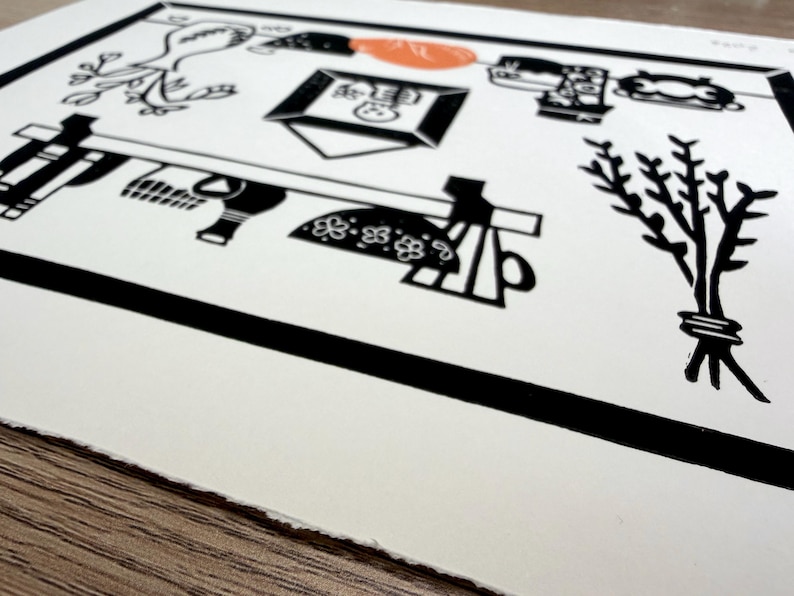 a close-up of the print from the top. a shelf at the top of the scene holds a mug, a bowl, a seeing stone, and assorted jars. the edge of the paper is torn in a straight line, giving the print a rustic handmade feel.