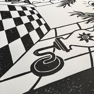 closeup of the bottom of the print. there is a pathway leading up to the doorway with a checkerboard pattern. with one point perspective, the path is widest at the bottom of the print and narrowest at the door