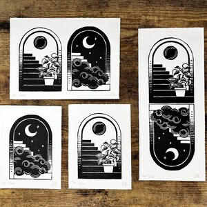 Four different prints made with the same two stamps. One is the print in this listing. The second has the two night and day arches side by side so neither is upside down. The third print has only the night arch, and the fourth has only the day arch.