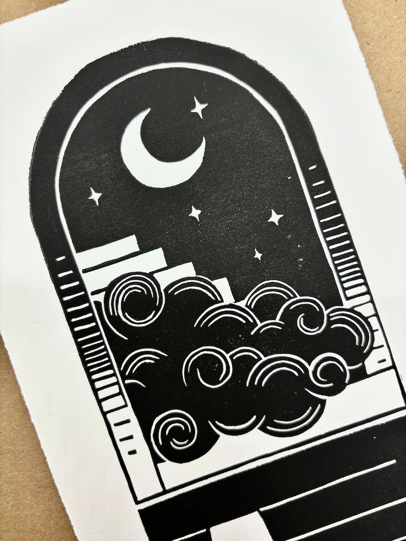 Straight-on closeup of the nighttime side. The cloud looks like it is billowing in front of the staircase from inside the portal arch. The edges of the paper are torn rather than cut, giving a rustic artful look.