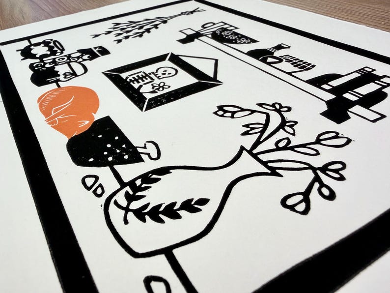 a close up of the lower right corner of the print. there is a vase full of dying roses and a mortar and pestle. an orange cat is sleeping on the counter next to the mortar and pestle.