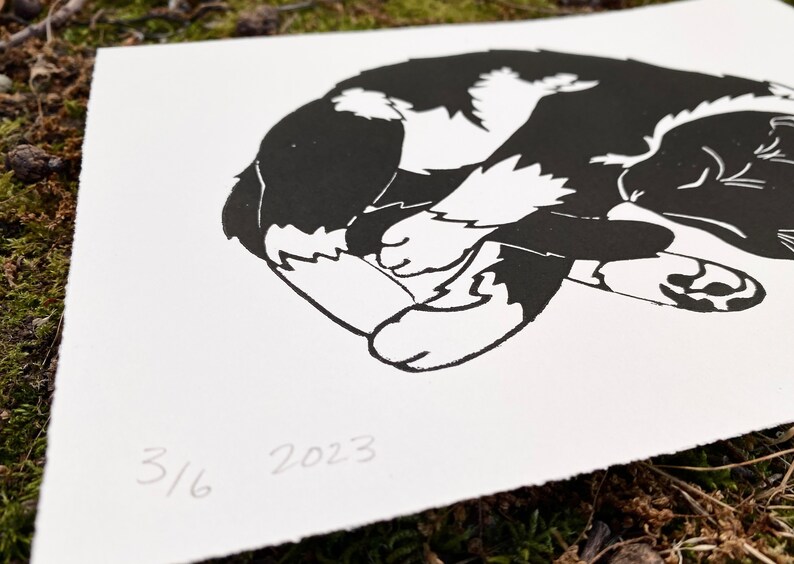 Closeup of the print. The year 2023 and print edition 3 of 6 are written in the lower left corner of the print. The edges of the paper are torn for a rustic look.