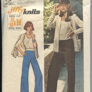 May include: Vintage Simplicity sewing pattern envelope showing two women in knit outfits. The envelope includes the text "Jiffyknits" and "Stretch Knits Only". The size is 14.