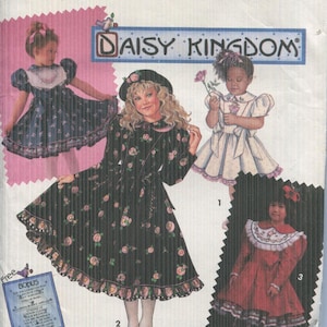 May include: Simplicity sewing pattern 8086 featuring Daisy Kingdom designs. The pattern includes illustrations of girls' dresses with floral and lace details. The package has a pink and white background with the Simplicity logo.