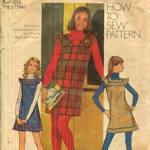 May include: Vintage Simplicity sewing pattern 5154. The pattern features three young women modeling dresses. The cover includes the text "How to Sew Pattern" and "Including a Tissue Lesson Chart on 'How to Work with Plaids'", with size and bust measurements.