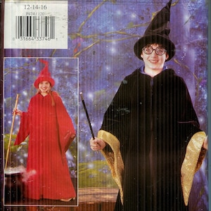 May include: Butterick P474 sewing pattern for children's wizard costumes. The pattern includes a black robe with gold trim, a pointed hat, and a wand. The image also shows a red robe and hat. Size 12-14-16.