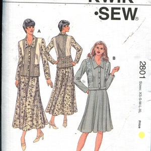 May include: Kwik Sew sewing pattern 2801, featuring three illustrated women's outfits. The pattern includes sizes XS-XL. The outfits include a jacket and skirt set, and a dress with a jacket. The pattern is designed by Kerstin Martensson.