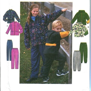 May include: Simplicity pattern 8342 for children's clothing. The image shows a girl and a boy wearing outfits made from the pattern. The pattern includes jackets and pants in various colors and patterns.