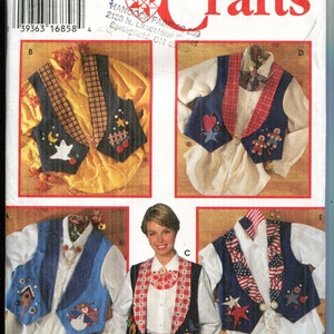 May include: Simplicity Crafts pattern featuring vests with various decorative appliqués. The vests are displayed on white shirts and include designs such as stars, hearts, and a snowman. The pattern also shows a woman wearing a vest.