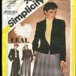 May include: Vintage Simplicity sewing pattern envelope featuring a woman in a black blazer, yellow blouse, and gray skirt. The envelope includes illustrations of other outfit options and the text "Simplicity" and "LEAL".