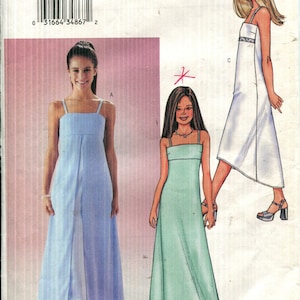 May include: A Butterick sewing pattern envelope with illustrations of three long dresses in light blue, mint green, and white. The envelope displays the number 3484 and the Butterick logo.