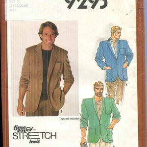 May include: Simplicity 9293 sewing pattern envelope featuring illustrations of men's blazers in brown, blue, and green. The envelope includes the text "Stretch Knit" and size information.
