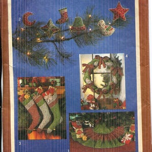 May include: Simplicity 9207 sewing pattern featuring Christmas-themed decorations. The pattern includes designs for a tree skirt, stockings, a wreath, and ornaments. The cover displays images of the finished projects, showcasing festive colors and patterns.