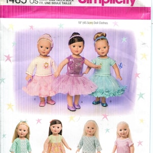 May include: Simplicity sewing pattern 1485 OS for 18-inch doll clothes. The pattern features various doll outfits, including dresses and tops with skirts. The image shows several dolls dressed in the outfits, with the Simplicity logo at the top.