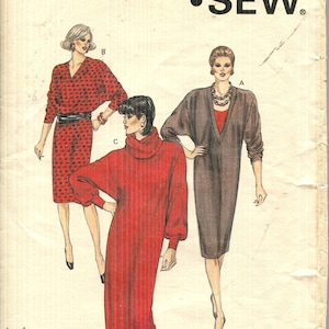 May include: Kwik Sew sewing pattern 1482 featuring three dress designs. The cover shows illustrations of the dresses, including a red dress with a turtleneck, a brown dress with a V-neck, and a red patterned dress. The pattern is designed by Kerstin Martensson.