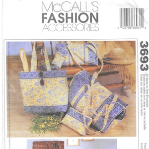 May include: McCall's Fashion Accessories pattern envelope featuring various tote bags, purses, and travel bags. The bags display floral and geometric patterns in yellow, blue, and red. The envelope includes the price and pattern number.