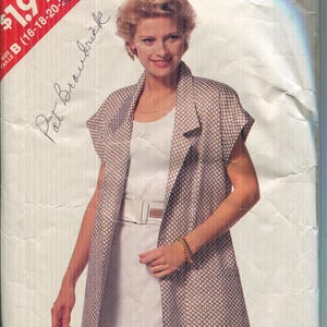 May include: A vintage sewing pattern package featuring a woman wearing a white dress and a patterned vest. The package has the text "See & Sew by Butterick 6388" and "Very Easy" on it.