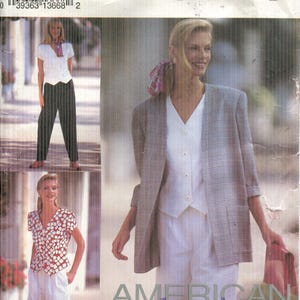 May include: Simplicity sewing pattern showing a woman in a blazer, shorts, and a top. The pattern includes options for a blazer, shorts, and a top. The words "American Classics" are visible on the pattern.