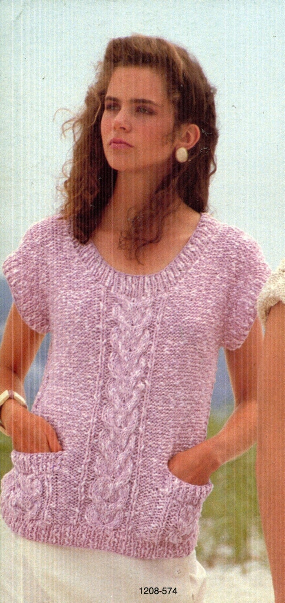 Hermosos hombros extendidos, manga casquillo, escote redondo