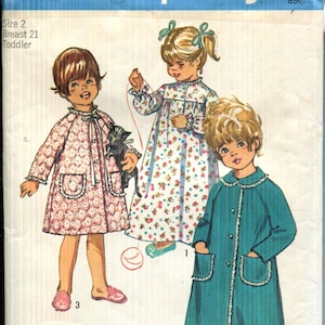 May include: Vintage Simplicity pattern envelope featuring illustrations of children's sleepwear. The envelope displays the number 9043 and the text "Size 2 Breast 21 Toddler". The illustrations show three children in different styles of sleepwear.