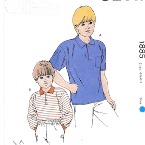 May include: Kwik Sew pattern 1885 featuring illustrations of two children wearing polo shirts and pants. The pattern includes sizes 4-5-6-7. The image has the Kwik Sew logo and the designer's name, Kerstin Martensson.