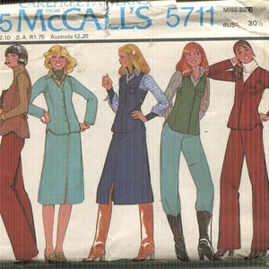May include: Vintage McCall's 5711 sewing pattern featuring illustrations of women's suits and separates. The pattern includes a jacket or vest, skirt, and pants. The cover displays the text "$1.75 McCall's 5711" and "Miss Size Bust 30 1/2".