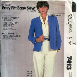 May include: McCall's Easy Fit Easy Sew pattern envelope featuring a woman in a blue jacket, white blouse, and pants. The envelope includes instructions for a blouse, pants, and jacket. The price is $2.00.