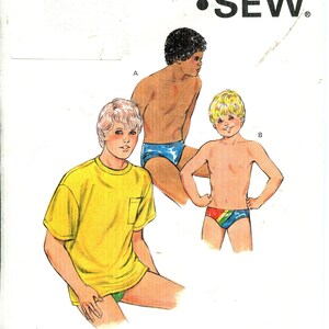 May include: Kwik Sew pattern 1609 featuring illustrations of young boys in swimwear. One boy wears a yellow t-shirt and green shorts. The other two boys are wearing swim briefs. The pattern sizes are 4-5-6-7.