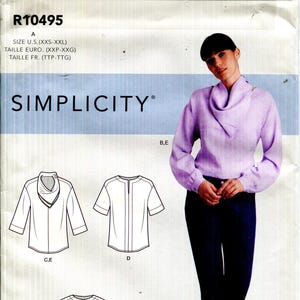 May include: Simplicity pattern R10495 features a woman wearing a lilac blouse and dark blue pants. The pattern includes diagrams for different blouse styles. The pattern size ranges from XXS to XXL.