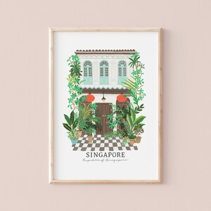 May include: A framed illustration of a traditional Singaporean shophouse with a checkered floor, green plants, and red lanterns. The text "SINGAPORE" and "Republic of Singapore" is below the illustration.