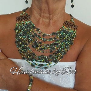 Handmade set of necklace, earrings and bracelet made of velvet seeds / black pearl seeds / mgambo tree seeds and other components #1 Yellow/green