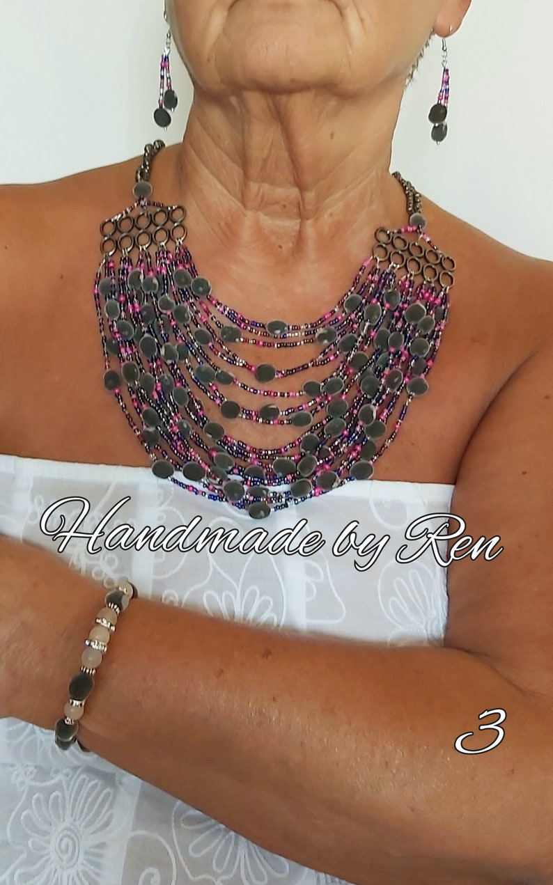 Handmade set of necklace, earrings and bracelet made of velvet seeds / black pearl seeds / mgambo tree seeds and other components #3 Fuchsia/blue