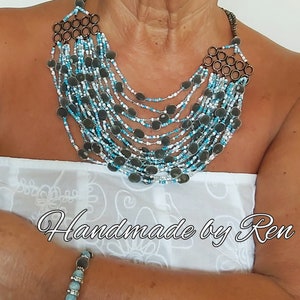 Handmade set of necklace, earrings and bracelet made of velvet seeds / black pearl seeds / mgambo tree seeds and other components #2 White/turquoise