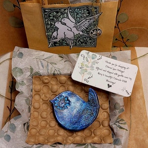 Natural ceramic clay small blue bird bowl with coppery golden shimmery accents. One of a kind and ready to ship. Item shown is item shipped.