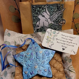 Natural ceramic clay star and folk art opalescent ornament dangle. Silk ribbon. One of a kind and ready to ship. Item shown is item shipped.