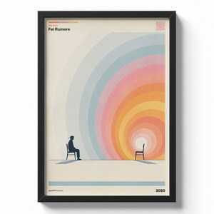 Może przedstawiać: Oprawiony plakat z minimalistyczną ilustracją osoby siedzącej na krześle naprzeciwko pustego krzesła. Duży, koncentryczny półokrąg w kolorach tęczy promieniuje od pustego krzesła. Tekst zawiera napisy Diodato, Fai Rumore oraz rok 2020.