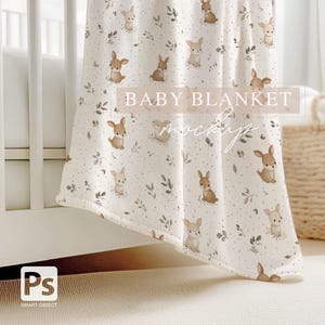 May include: A white baby blanket with a repeating pattern of brown deer and leaves. The blanket is draped over a white cot and has the text "BABY BLANKET MOCKUP" printed on it.