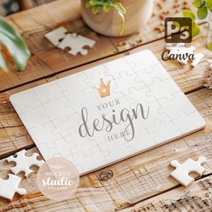 May include: White jigsaw puzzle with a gold crown and the text "YOUR design HERE" on a wooden surface.