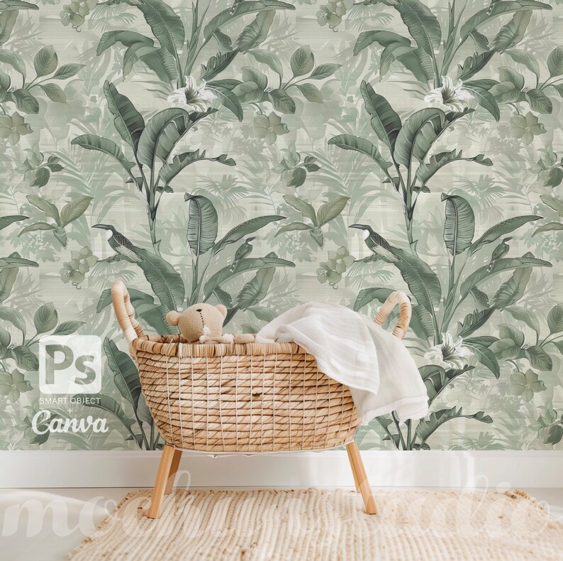 May include: A wicker basket with a white blanket and a teddy bear inside, set against a green and white tropical wallpaper with a repeating pattern of palm leaves and birds.