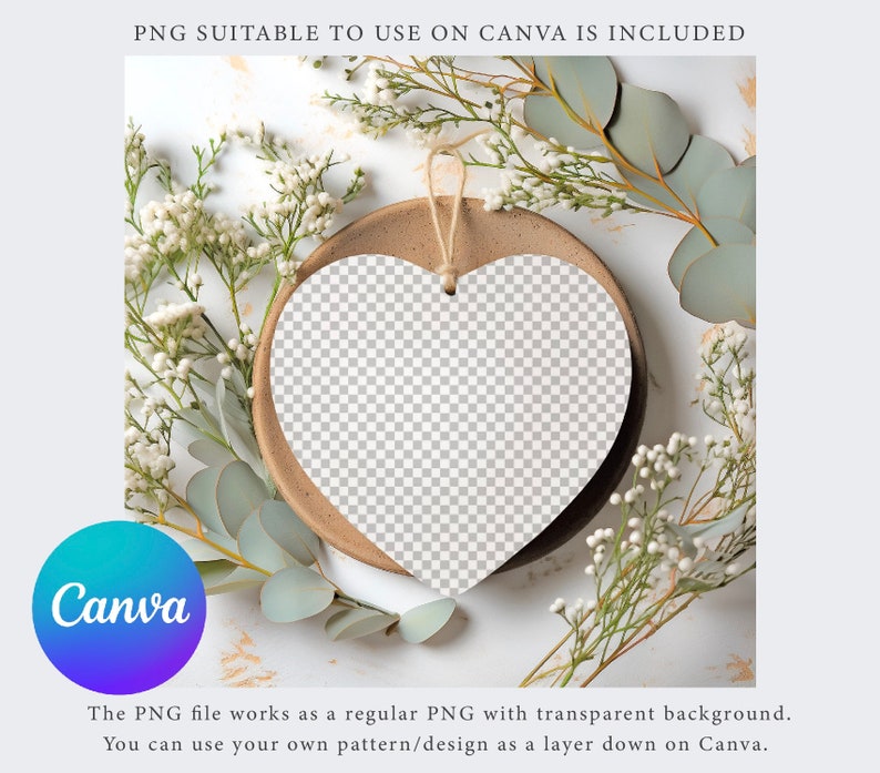 May include: A white heart-shaped sign with a transparent background, hanging from a string, on a brown plate with white flowers and green leaves around it.