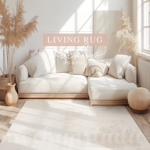May include: A living room mockup featuring a cream-colored sectional sofa with several pillows, a beige rug, and decorative pampas grass in a woven basket. The text "LIVING RUG mockups" is displayed in a pink rectangle. The room is bathed in natural light.