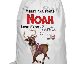 Pode incluir: Saco de presente de Natal branco com uma ilustração de rena, o texto "Feliz Natal Noah Amor do Papai Noel", e uma lista de verificação com uma marca de verificação ao lado de "Nice".
