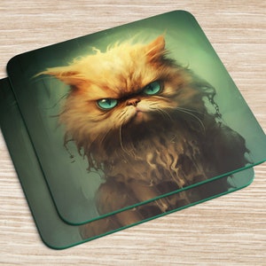 May include: A close-up of a grumpy-looking, long-haired, light brown cat with blue eyes. The cat is covered in a substance that looks like melted chocolate.
