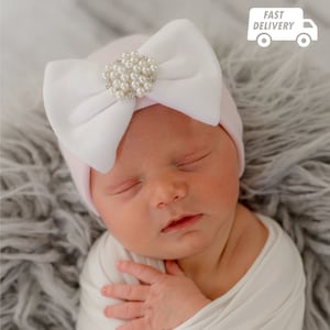 Melondipity Pink, White Newborn Baby Girl Hospital Hat with Irene Bow and Pearl Rhinestone Center | Double Ply for Extra Warmth and Comfort