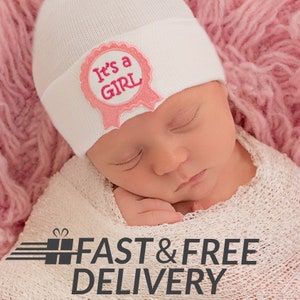Melondipity Newborn Girls White Hospital Hat with a Pink Ribbon Patch That Read &quot;It&#39;s a Girl&quot; | Double Ply for Extra Warmth and Comfort